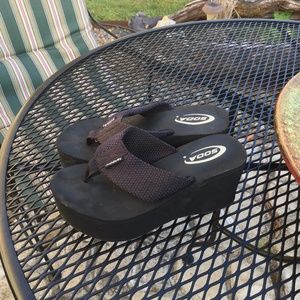 Black wedge flip flops